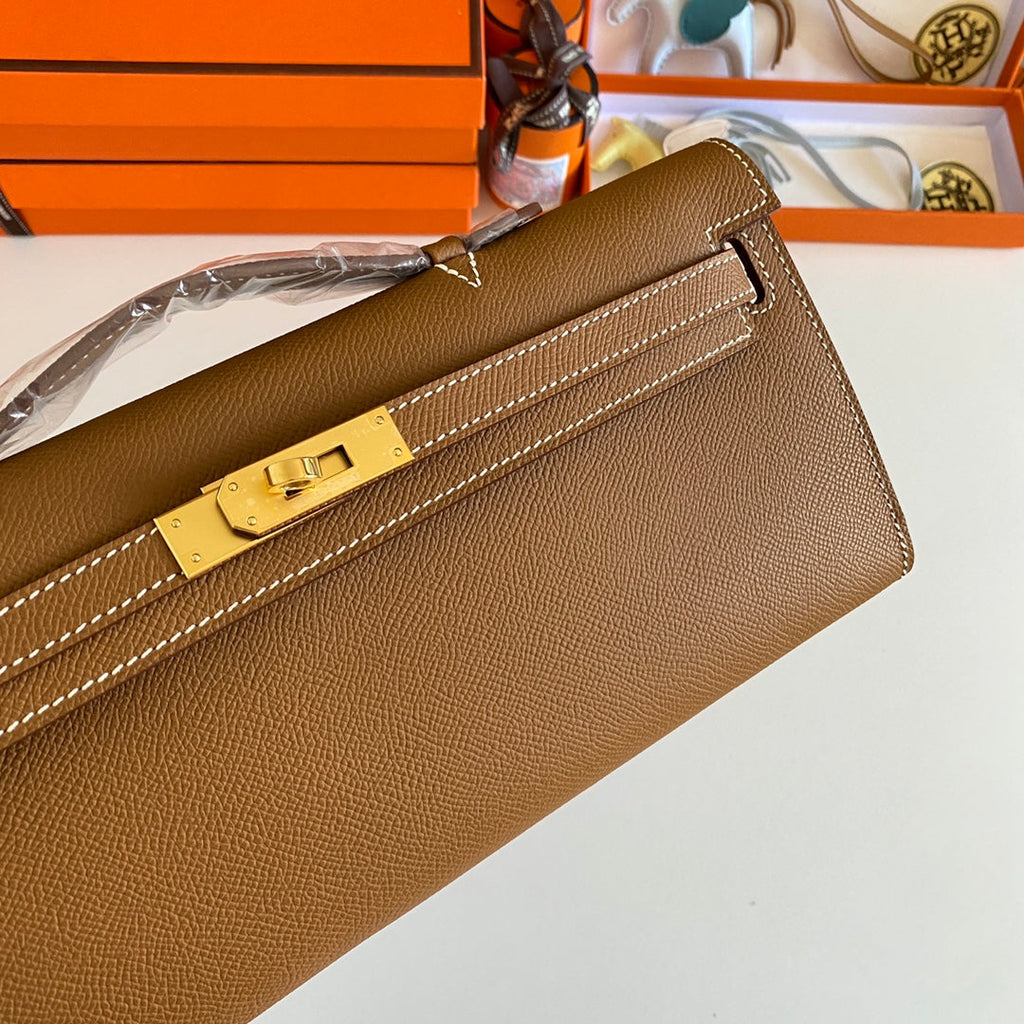 HERMES KELLY CUT 31 IN BRONZE BROWN CALFSKIN WITH GOLD HARDWARE