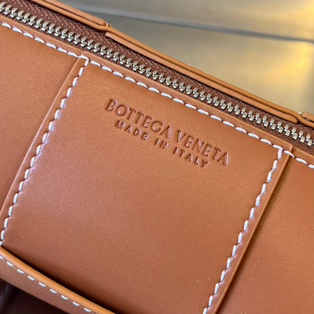 BOTTEGA VENETA SMALL CYLINDER CASSETTE 21 IN RAW SIENNA CALFSKIN