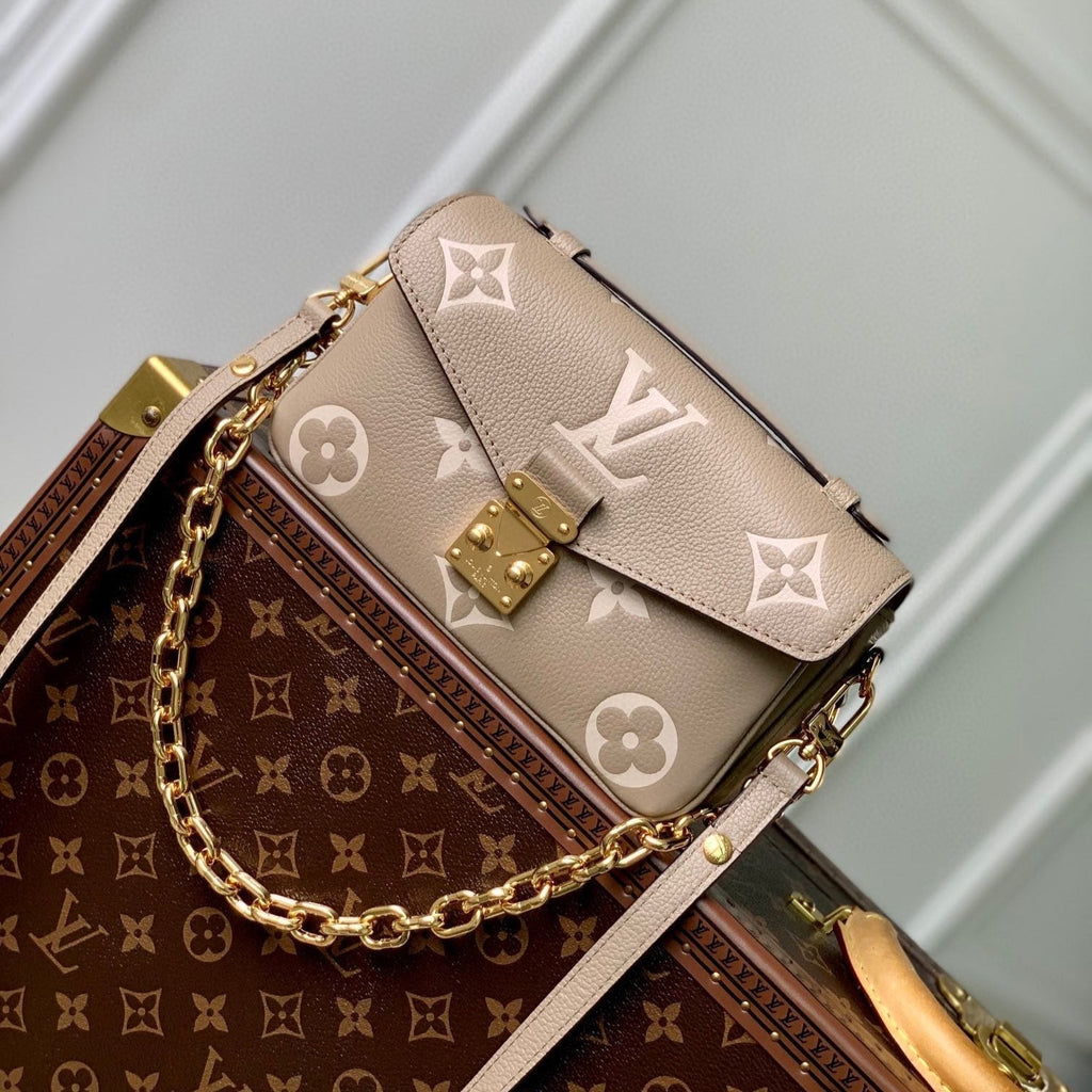 LOUIS VUITTON POCHETTE MÉTIS EAST WEST 21 IN BEIGE MONOGRAM EMPREINTE CALFSKIN EMBOSSED LOGO