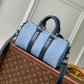 LOUIS VUITTON KEEPALL BANDOULIÈRE 25 INSKY BLUE MONOGRAM HERITAGE CANVAS DARK BLUE CALFSKIN