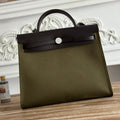 HERMES ZIP CABINE 31 BAG IN OLIVE GREEN CANVAS AND BLACK CALFSKIN