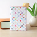 LOUIS VUITTON DOLL PASSPORT WALLET IN WHITE MIX COLORFUL CALFSKIN