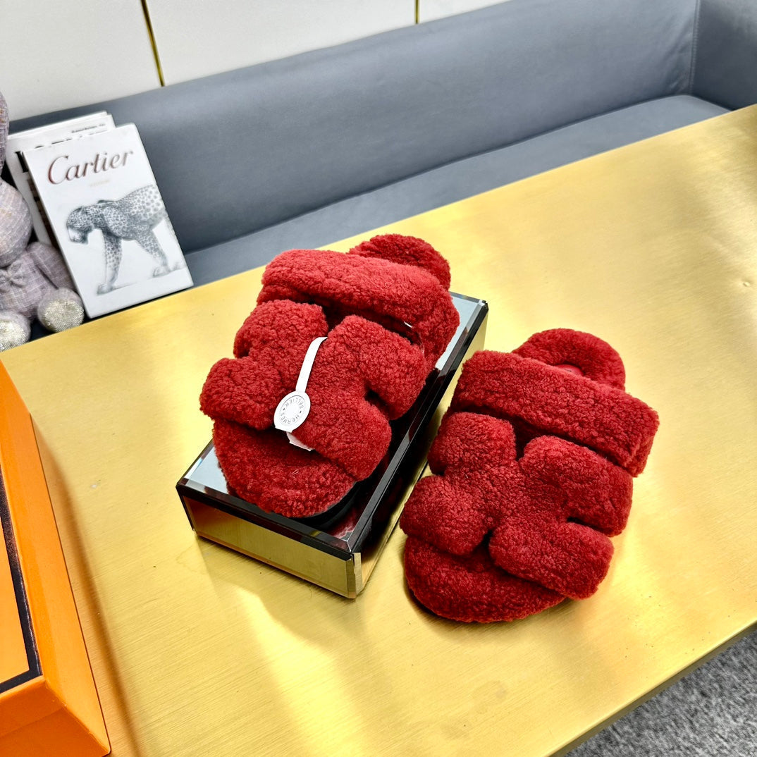 HERMES CHYPRE SANDAL IN SCARLET RED SHEARLING